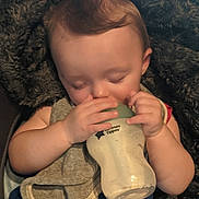 Jaxon joined the competition — help win amazing prizes! baby, blanket, bottle, child, clothing, cozy, cute, face, feeding, hands, indoor, infant, naptime, peaceful, person, relaxing, resting, sleeping, soft, young