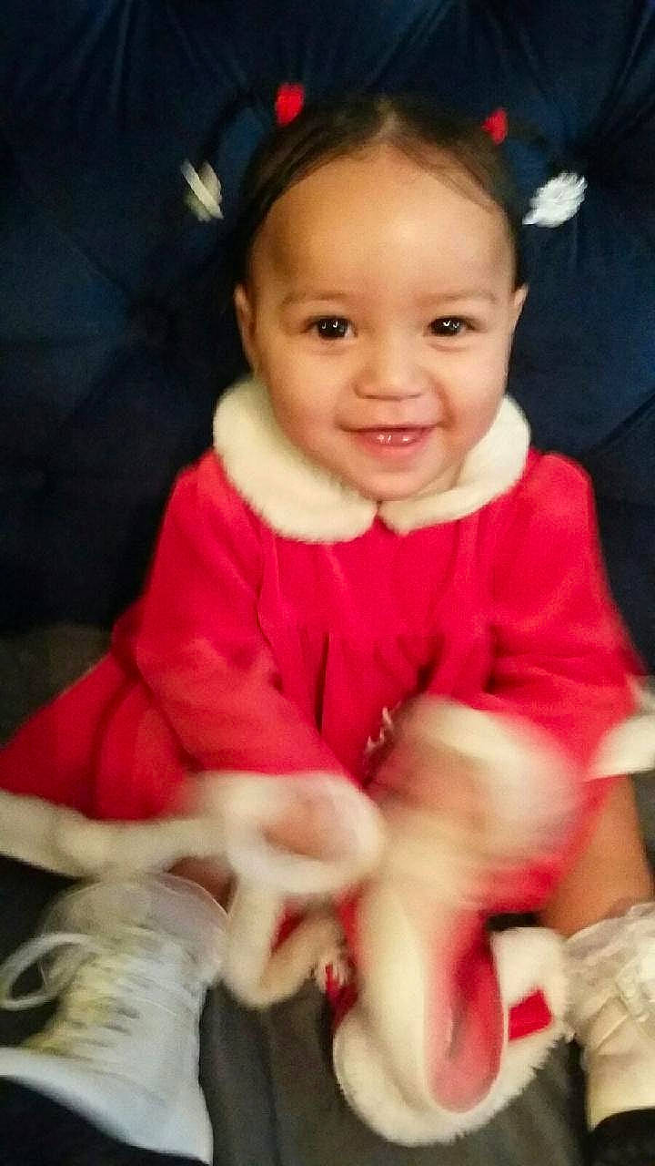 Miracle is registered to the contest to win money with this photo: baby, baby_toddler_clothing, cheek, child, comfort, cool, eye, face, finger, flash_photography, fun, hairstyle, happy, head, human_body, joy, nose, person, skin, sleeve