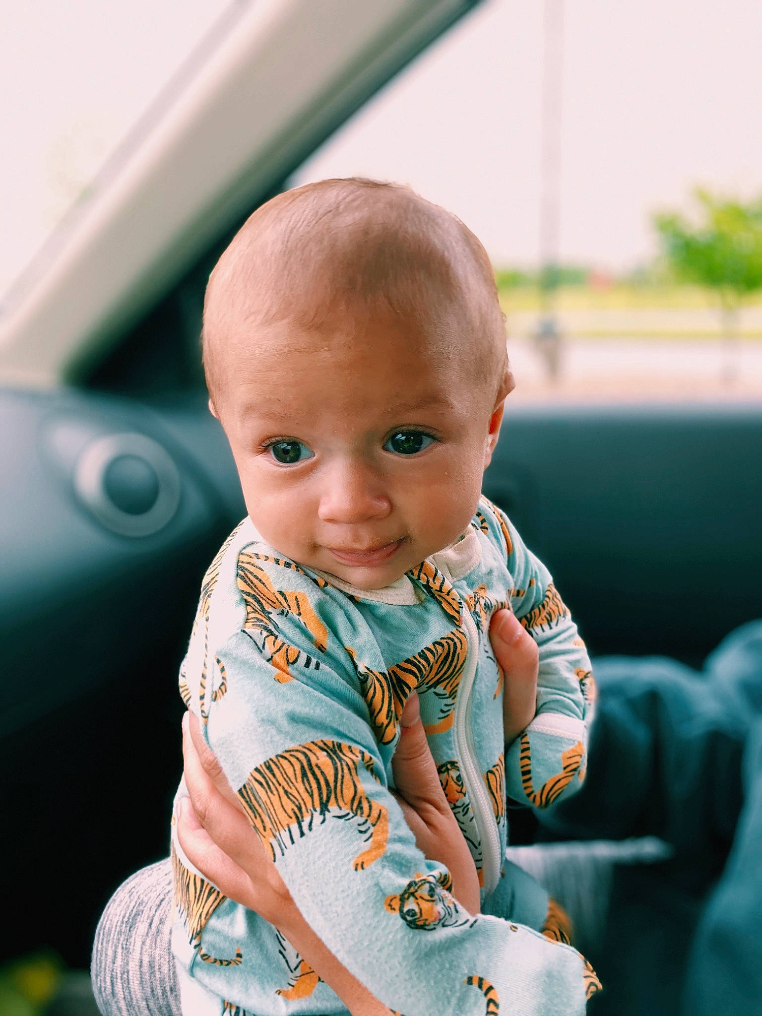 Kooper is registered to the contest to win money with this photo: baby, baby_products, cheek, child, ear, eye, face, grass, happy, head, person, photography, sitting, skin, smile, toddler