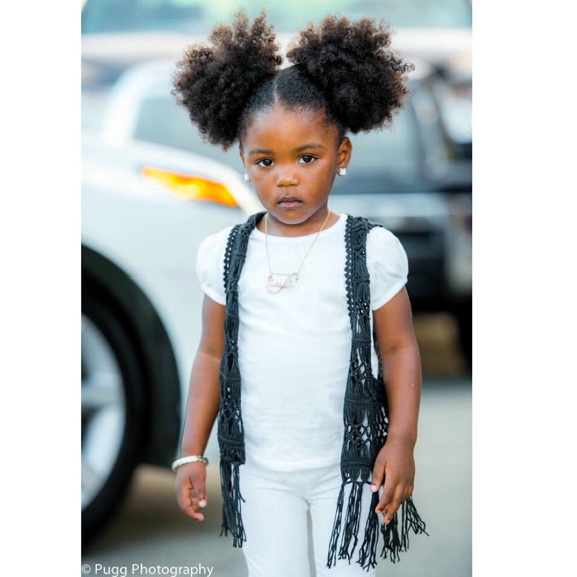 Cassie is registered to the contest to win money with this photo: afro, child, hair, hair_coloring, hairstyle, neck, outerwear, person