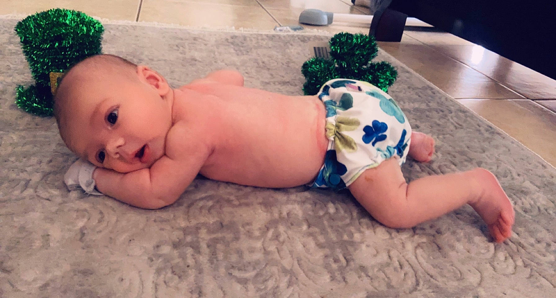 Luca is registered to the contest to win money with this photo: abdomen, baby, barefoot, black_hair, chest, child, fawn, fun, happy, headgear, human_leg, joint, leisure, muscle, person, plant, skin, thigh, toddler, trunk