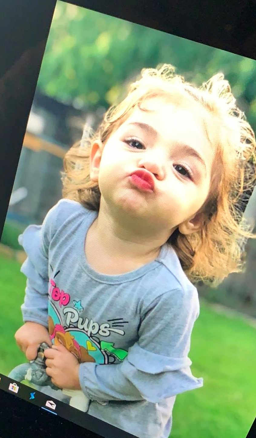 Mia Renee Rios is registered to the contest to win money with this photo: blond, cheek, child, cool, eye, face, fun, grass, hair, happy, lip, nose, photography, play, smile, sunlight, toddler