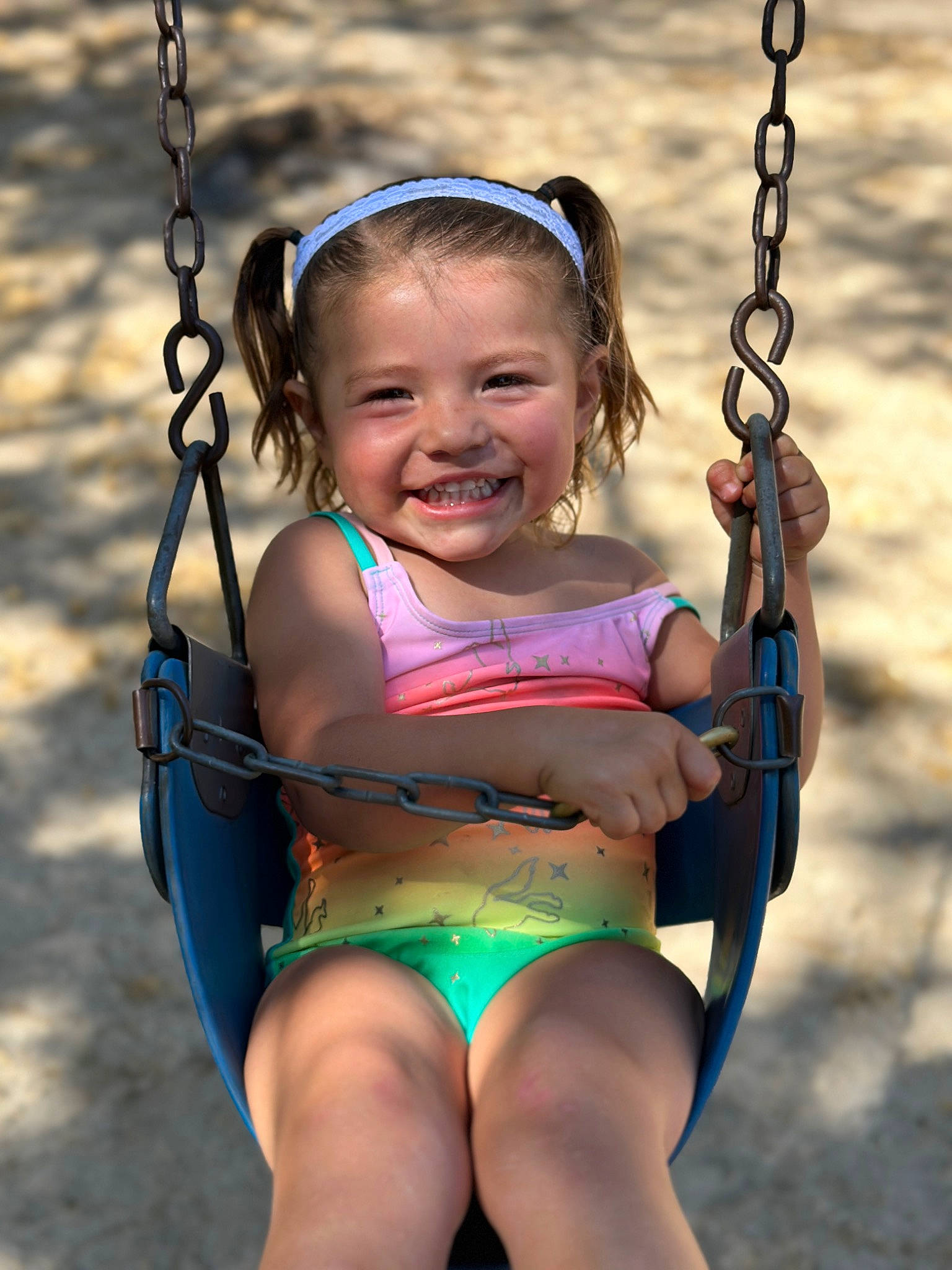 Amarís joined the competition — help win amazing prizes! black, eye, eyewear, face, finger, fun, hand, happy, head, joy, leisure, organ, person, photograph, pink, playground, skin, smile, summer, swing