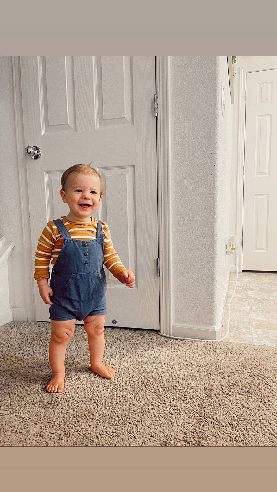 Bear joined the competition — help win amazing prizes! baby, baby_toddler_clothing, barefoot, door, dress, floor, flooring, foot, gesture, grass, happy, human_leg, joy, leg, people_in_nature, person, shorts, sleeve, smile, standing