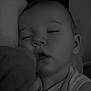 Elias participe au concours pour gagner de l'argent avec cette photo : baby, sleeping, closeup, face, infant, peaceful, monochrome, portrait, child, rest, soft, cuddling, indoors, head, person, quiet, comfort, nap, skin, young