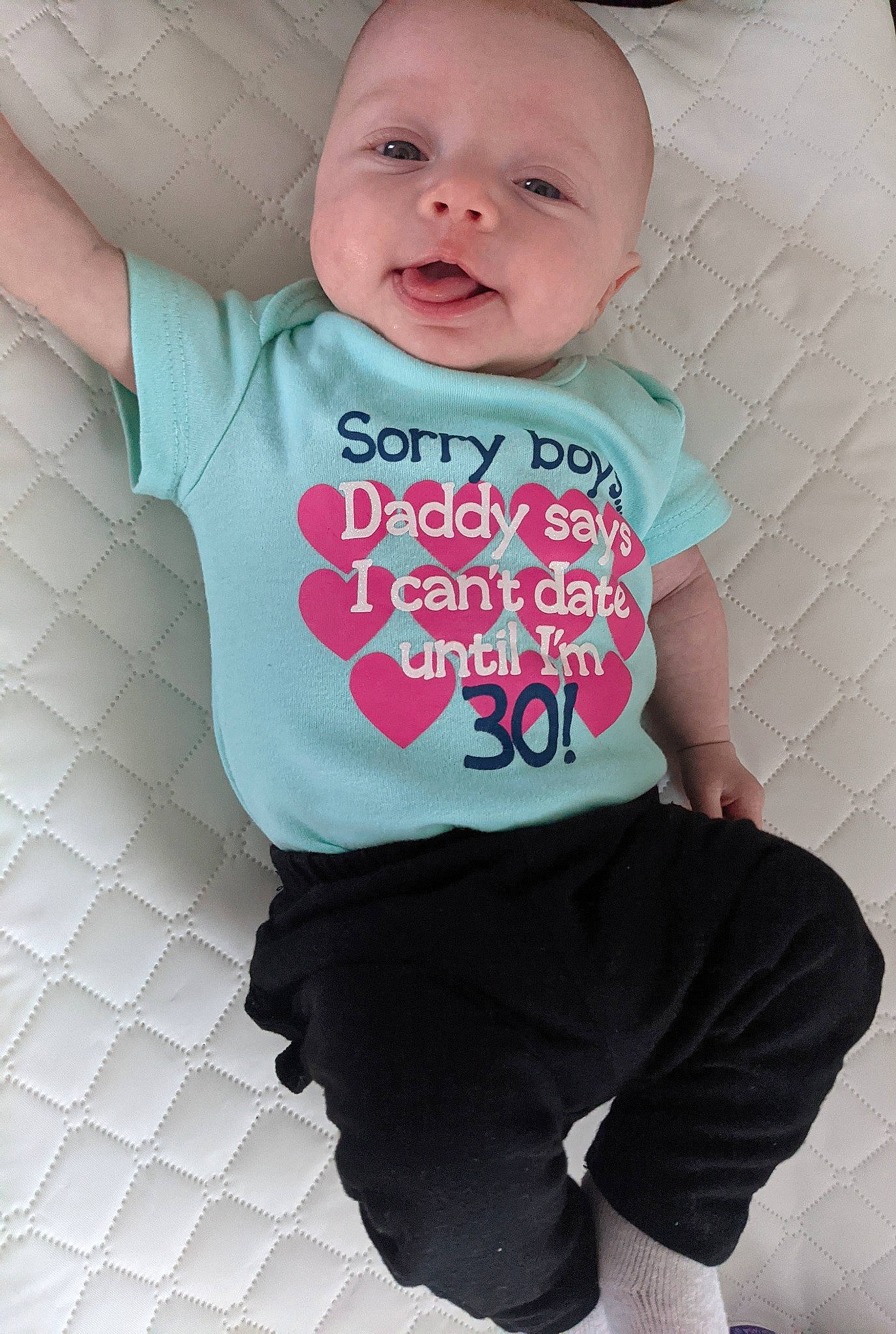 Adella joined the competition — help win amazing prizes! baby, baby_products, baby_toddler_clothing, cheek, child, electric_blue, happy, magenta, pattern, person, pink, product, sleeve, smile, sportswear, standing, t_shirt, textile, thigh, toddler