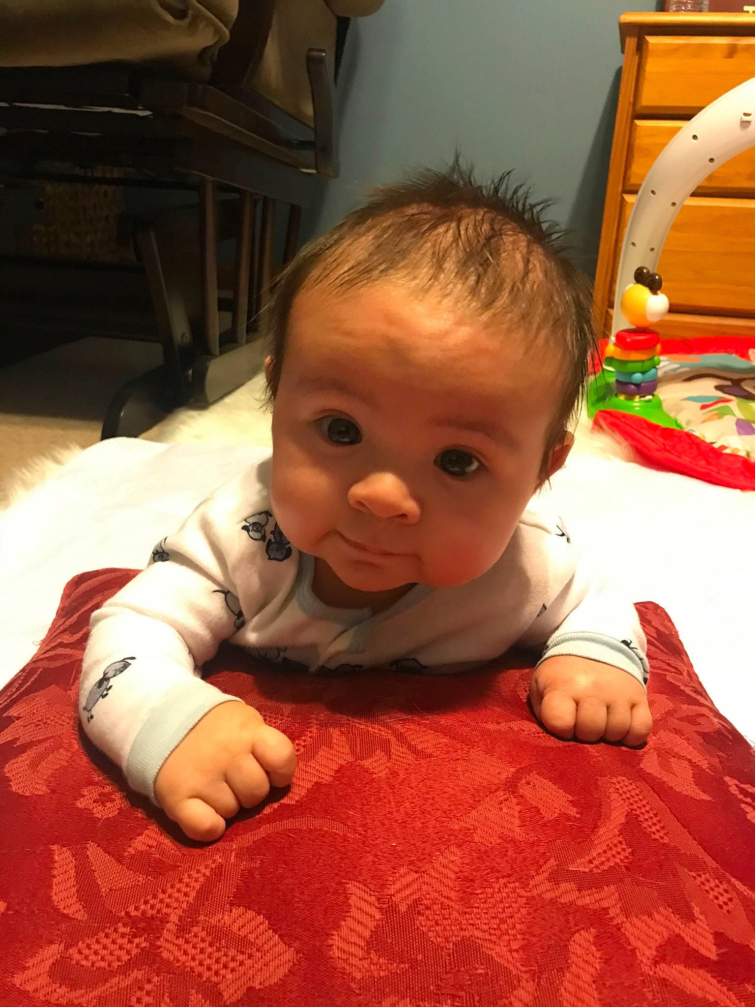 Joshua is registered to the contest to win money with this photo: baby, cheek, child, crawling, flooring, head, person, skin, toddler, tummy_time