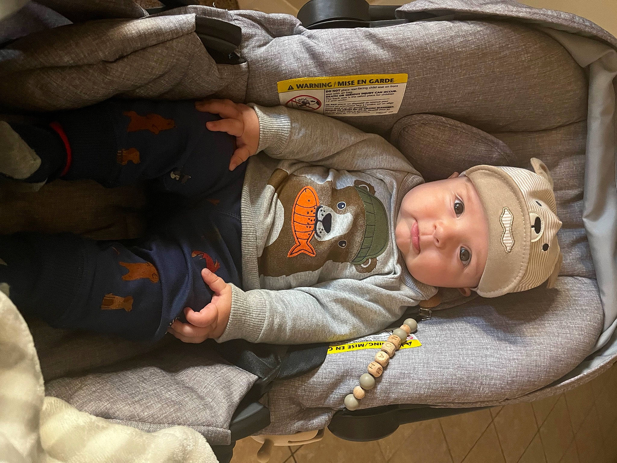 Noah is registered to the contest to win money with this photo: auto_part, baby, baby_carriage, baby_in_car_seat, baby_products, baby_sleeping, baby_toddler_clothing, bag, car_seat, carmine, child, comfort, headwear, nap, person, personal_protective_equipment, product, sitting, sleep, toddler