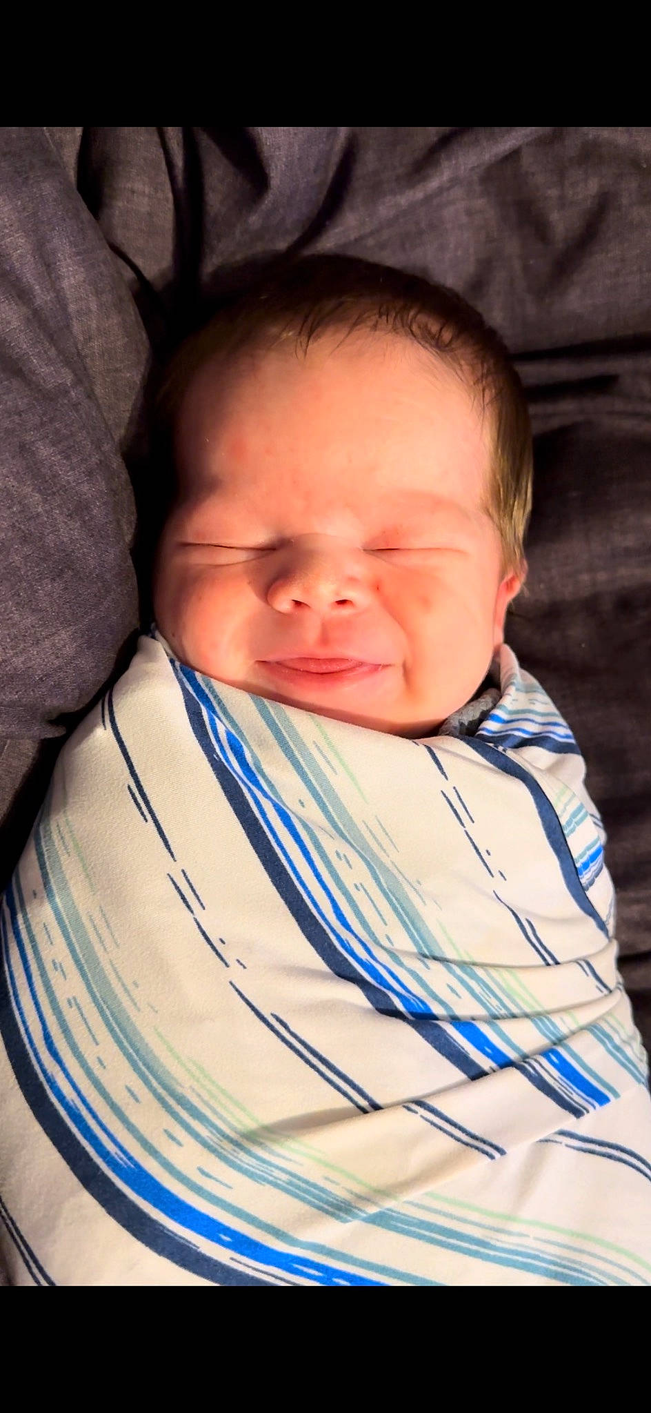 Kylan is registered to the contest to win money with this photo: baby, baby_toddler_clothing, cheek, child, comfort, electric_blue, eye, eyebrow, fun, happy, iris, linens, lip, mouth, neck, nose, person, sleeve, smile, textile