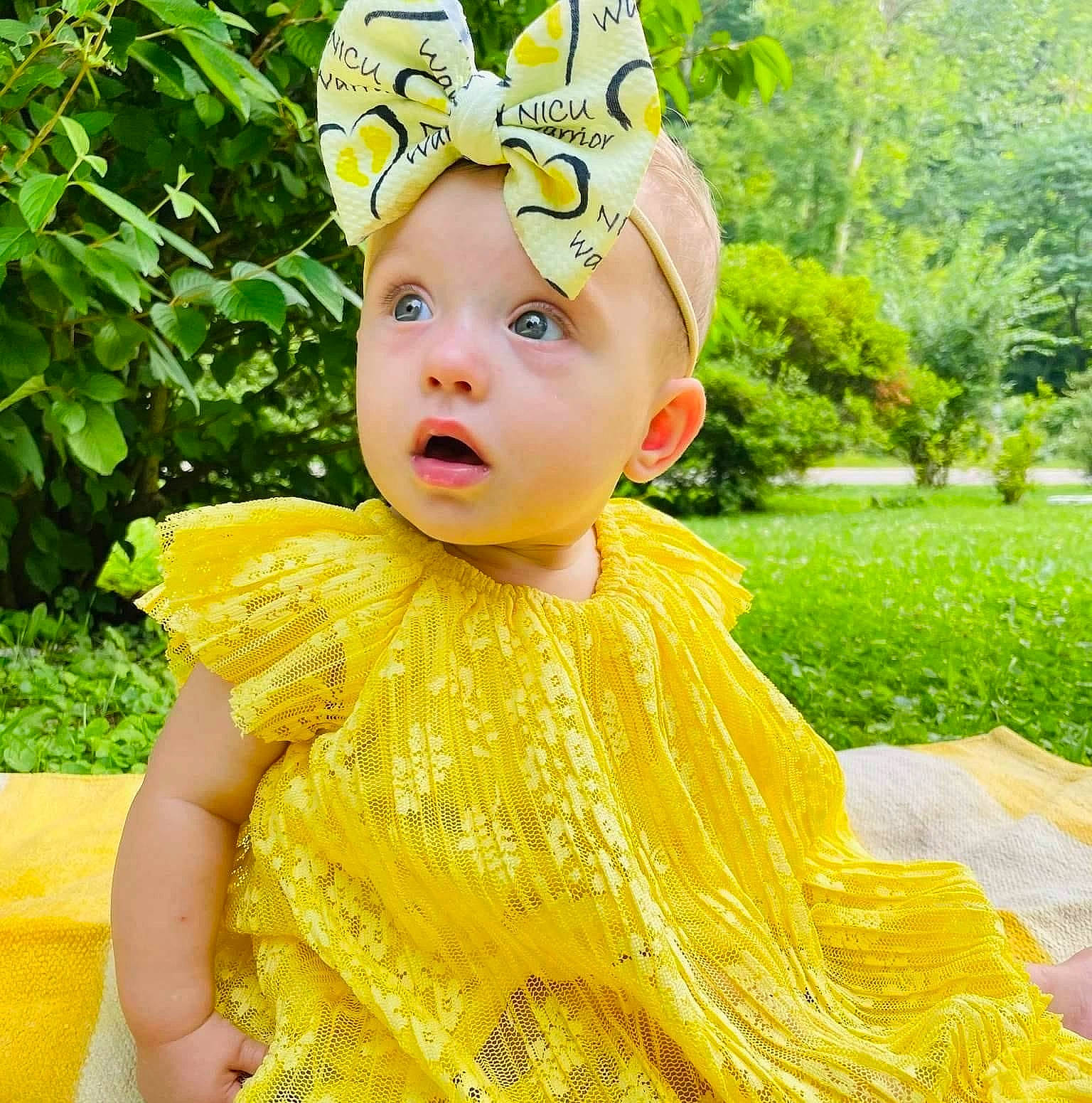 Hadleigh joined the competition — help win amazing prizes! baby, baby_toddler_clothing, costume, costume_hat, crown, dress, event, fashion_accessory, fun, grass, happy, headpiece, headwear, leisure, magenta, peach, people_in_nature, person, plant, spring