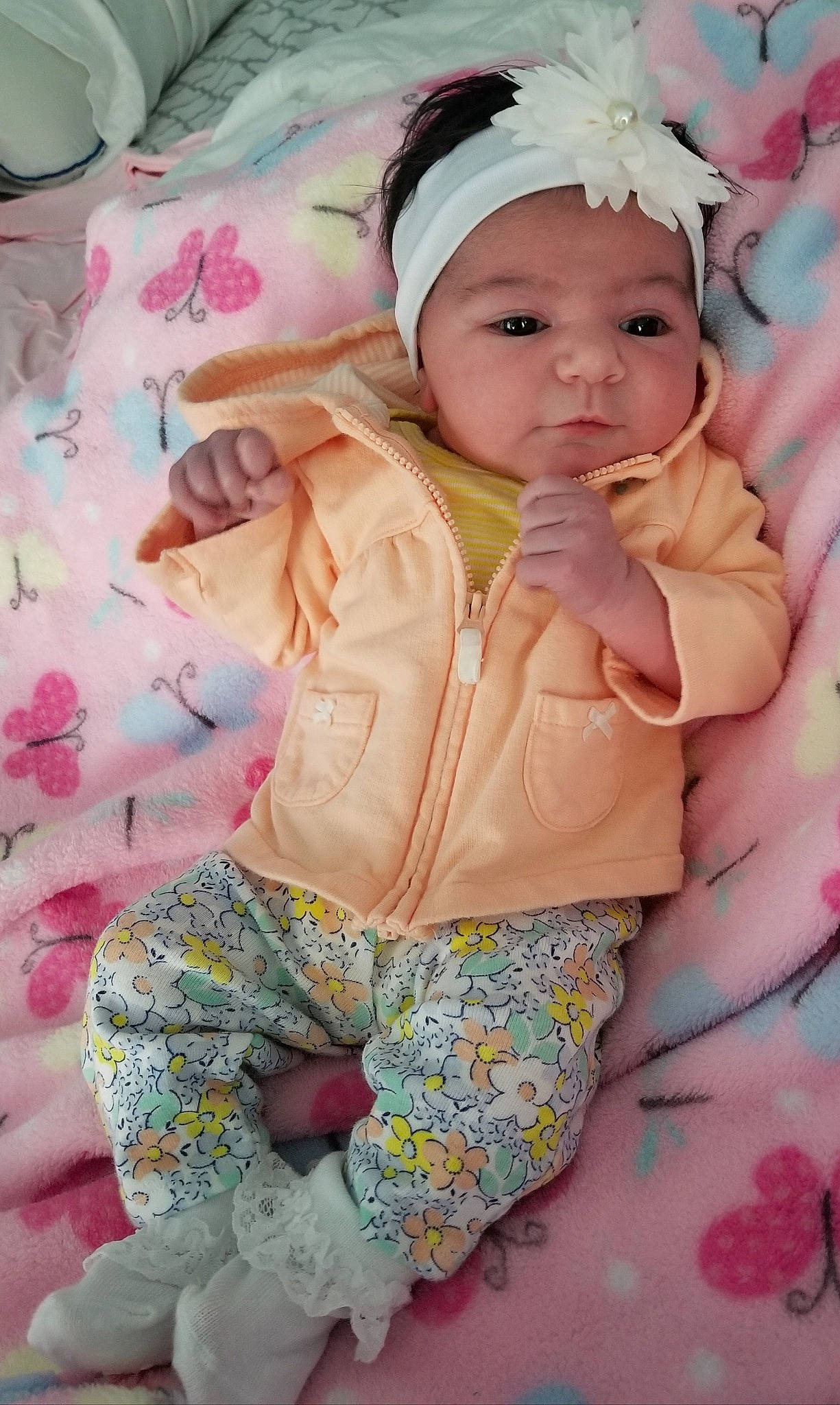 Audriana is registered to the contest to win money with this photo: baby, baby_toddler_clothing, cheek, child, hair_accessory, headgear, headwear, person, pink, skin, toddler