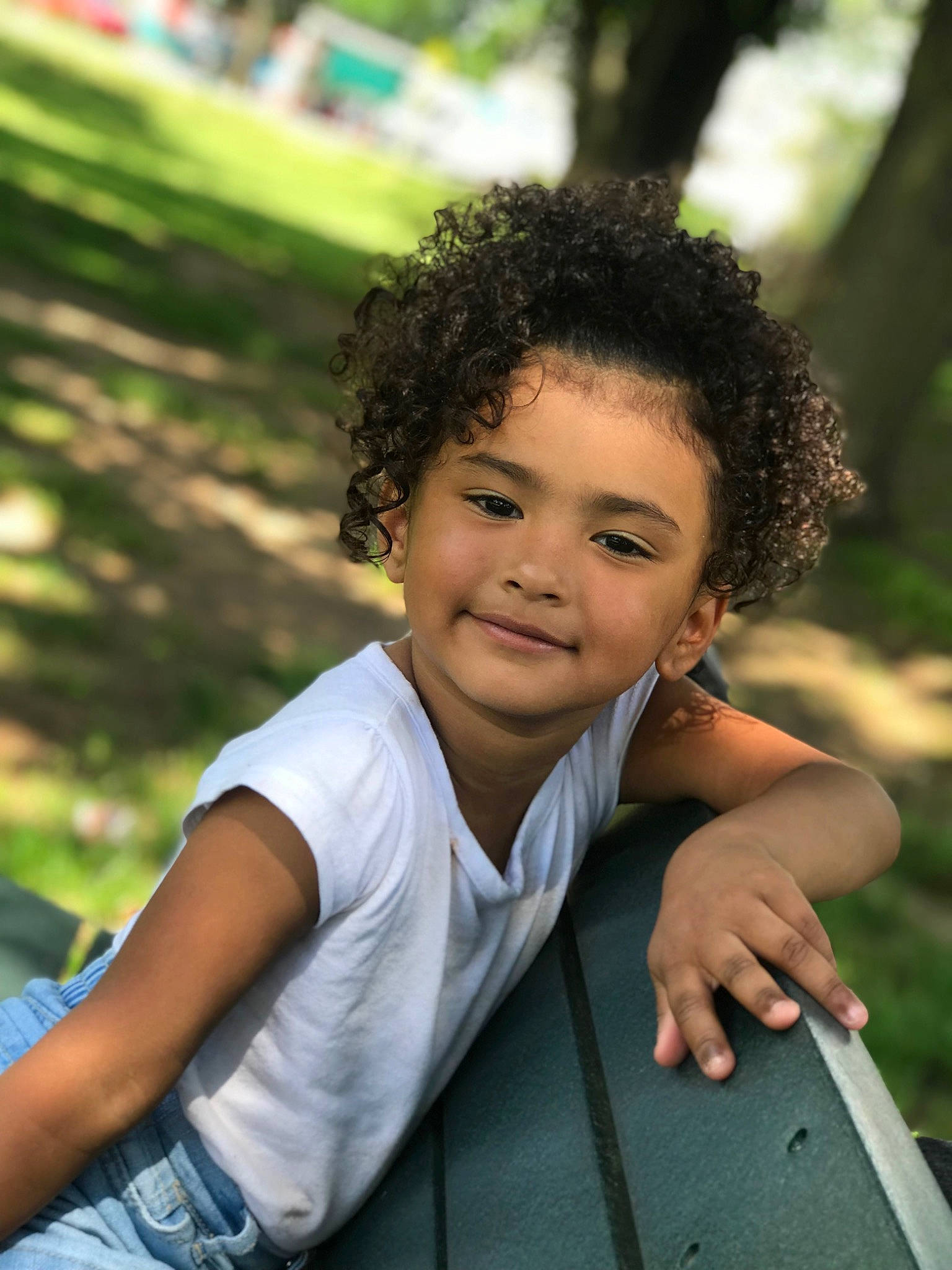 Jaslynn is registered to the contest to win money with this photo: adaptation, black_hair, child, child_model, fun, hair, hairstyle, happy, joy, leisure, person, photography, portrait_photography, sitting, smile