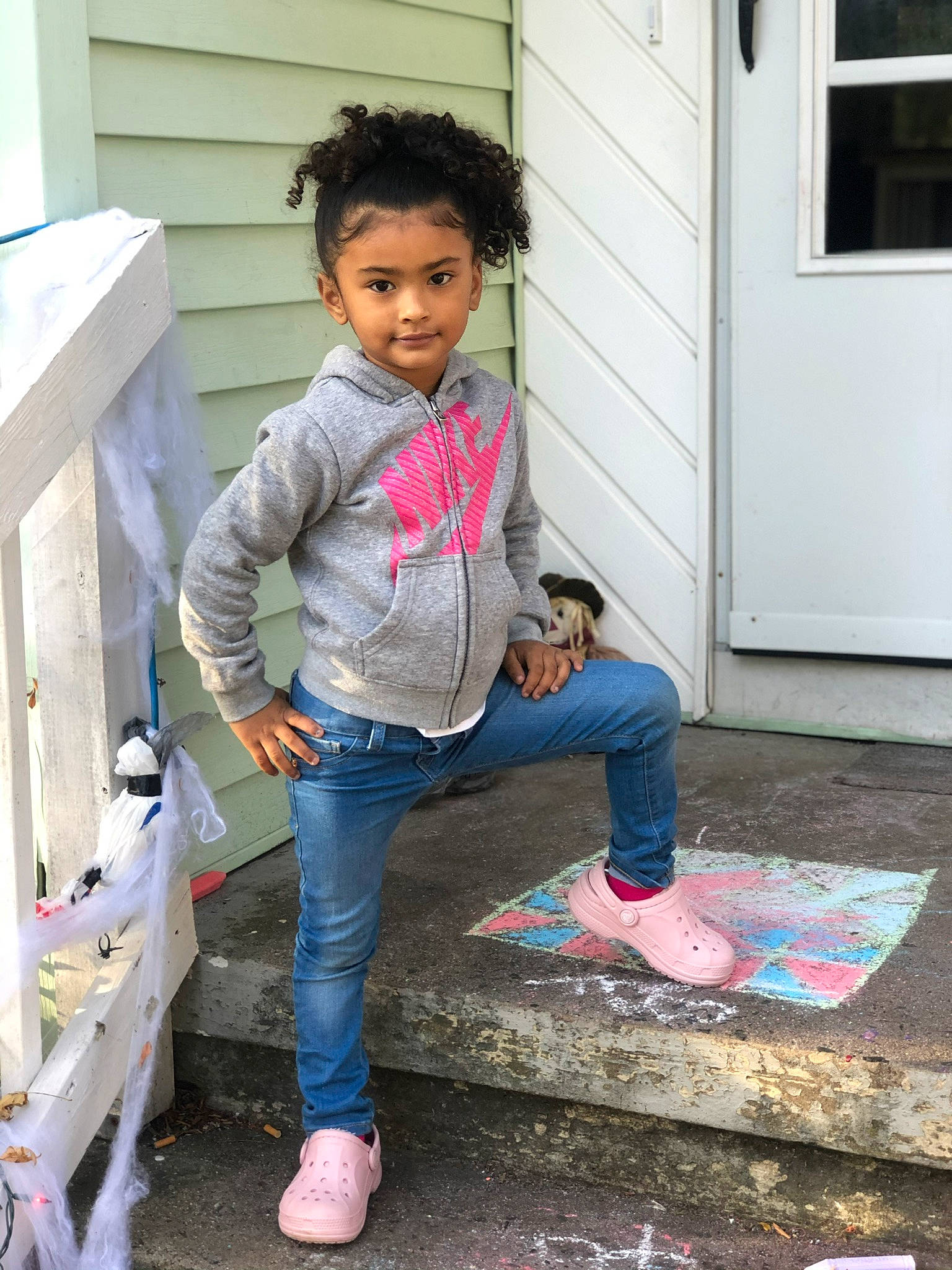Jaslynn is registered to the contest to win money with this photo: child, daughter, denim, footwear, home, house, jeans, leg, person, pink, play, shoe, t_shirt, toddler, vacation