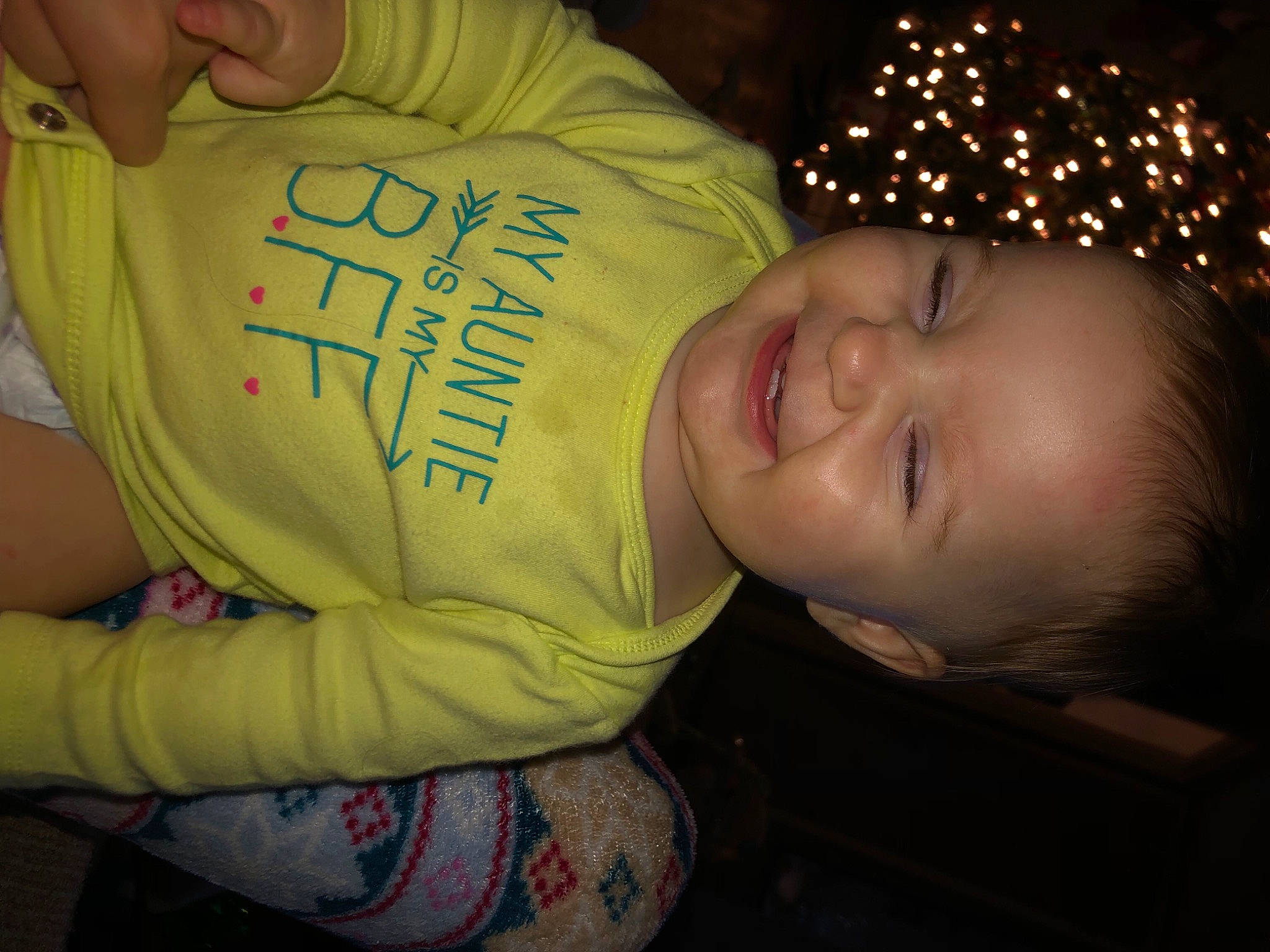 Patience is registered to the contest to win money with this photo: baby, cheek, child, elbow, event, facial_expression, finger, flash_photography, forehead, fun, grass, happy, mouth, nose, organ, person, skin, sleeve, smile, toddler