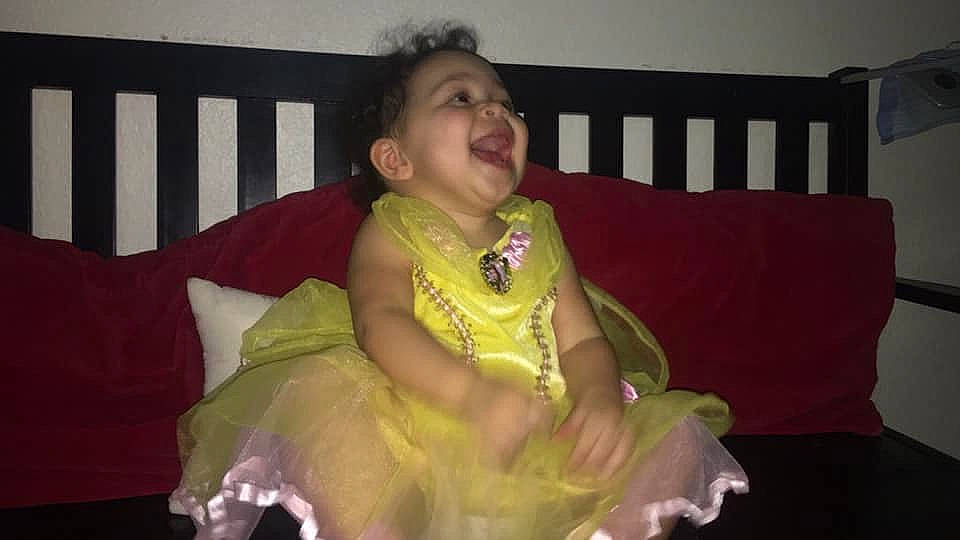 Isabella is registered to the contest to win money with this photo: child, eye, fun, iris, lady, person, sitting, smile, toddler