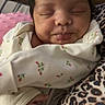 Ariannah joined the competition — help win amazing prizes! baby, infant, sleeping, face, hand, onesie, clothing, pattern, floral, leopard_print, blanket, cute, resting, newborn, soft, peaceful, portrait, indoor, closeup, person