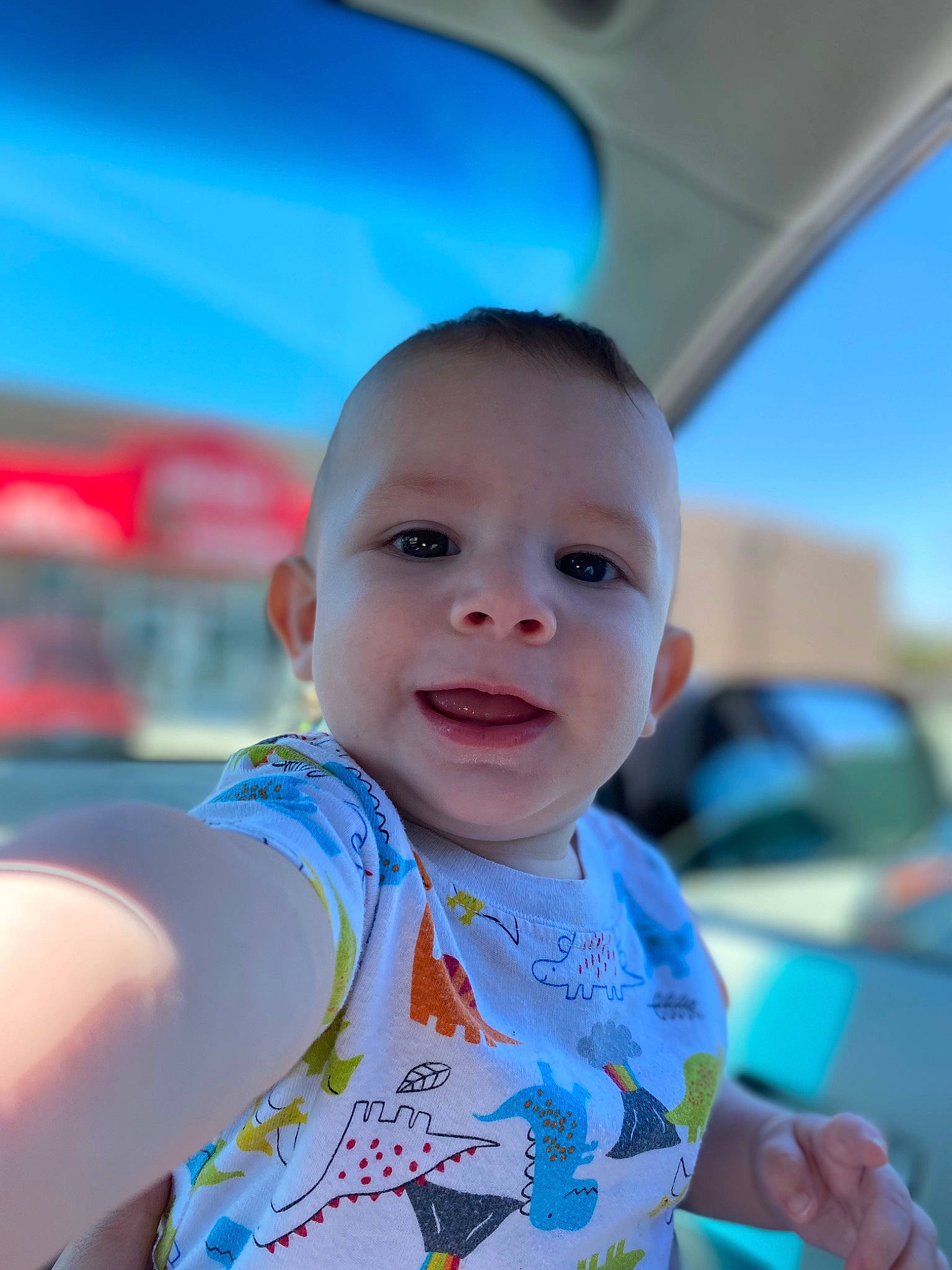 Theodore is registered to the contest to win money with this photo: azure, baby, baby_toddler_clothing, beauty, child, chin, electric_blue, fun, grass, hairstyle, hand, happy, iris, leisure, person, recreation, skin, sleeve, smile, toddler