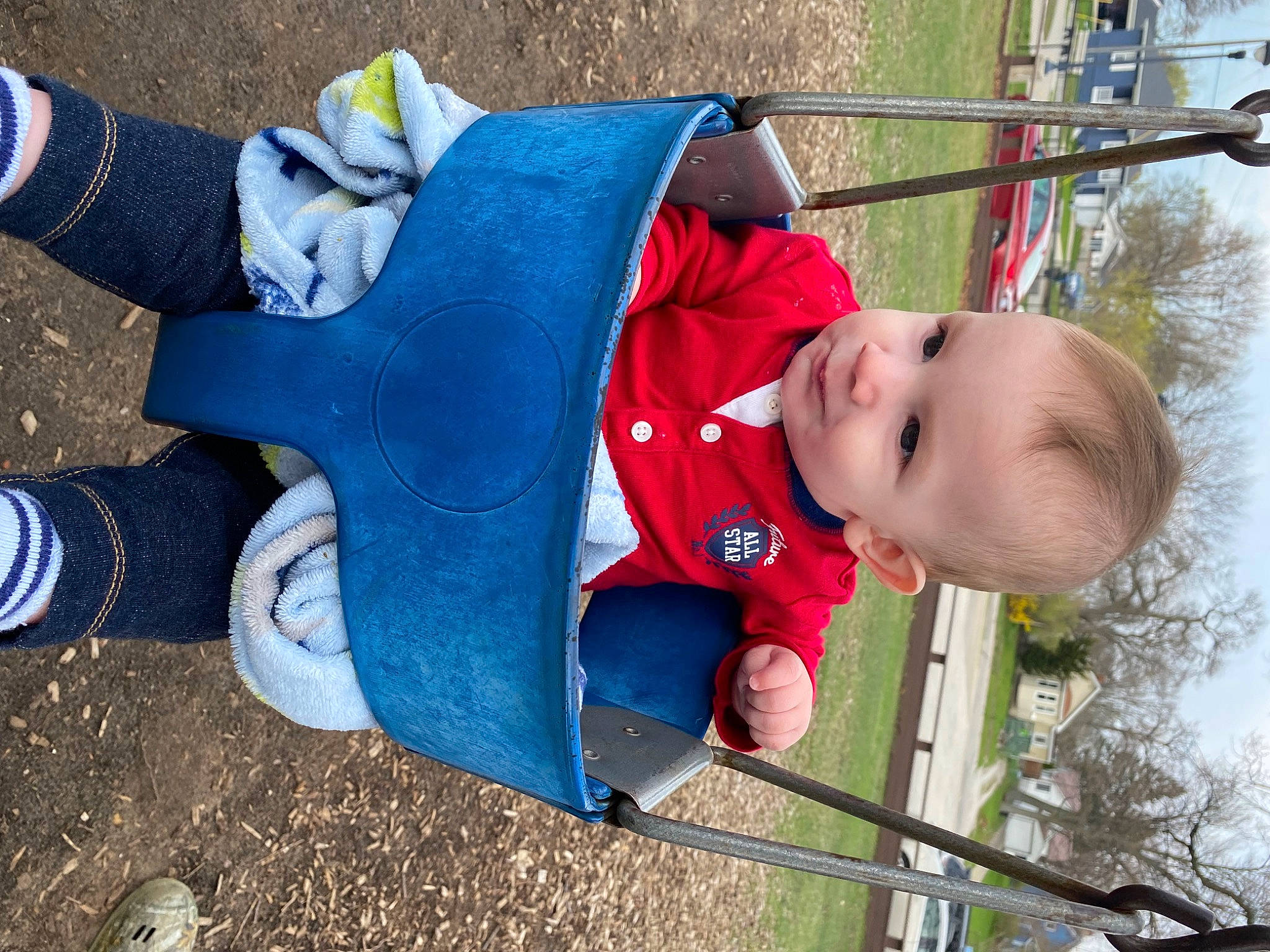 Theodore joined the competition — help win amazing prizes! baby, baby_products, baby_toddler_clothing, blue, child, city, electric_blue, foot, fun, grass, human_leg, leisure, outdoor_play_equipment, person, plant, recreation, sneakers, sock, swing, toddler