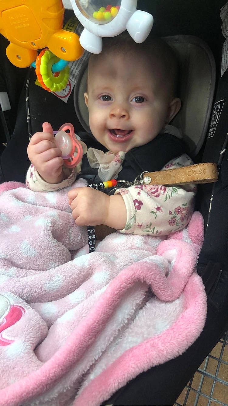 Kathleen joined the competition — help win amazing prizes! baby, baby_products, baby_toddler_clothing, cheek, child, finger, fun, gesture, happy, mouth, organ, person, photograph, pink, product, skin, smile, stuffed_toy, toddler, toy