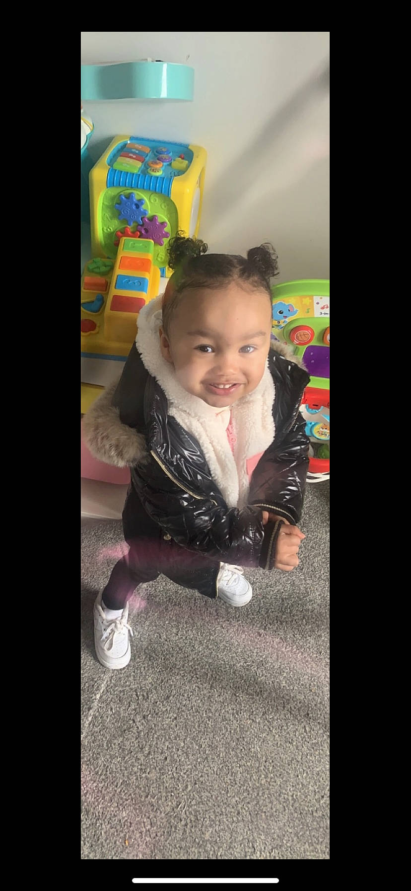 Sofia is registered to the contest to win money with this photo: baby, baby_toddler_clothing, cheek, child, flash_photography, flooring, fun, grass, happy, joy, laugh, magenta, pattern, person, play, portrait_photography, room, sitting, sleeve, smile