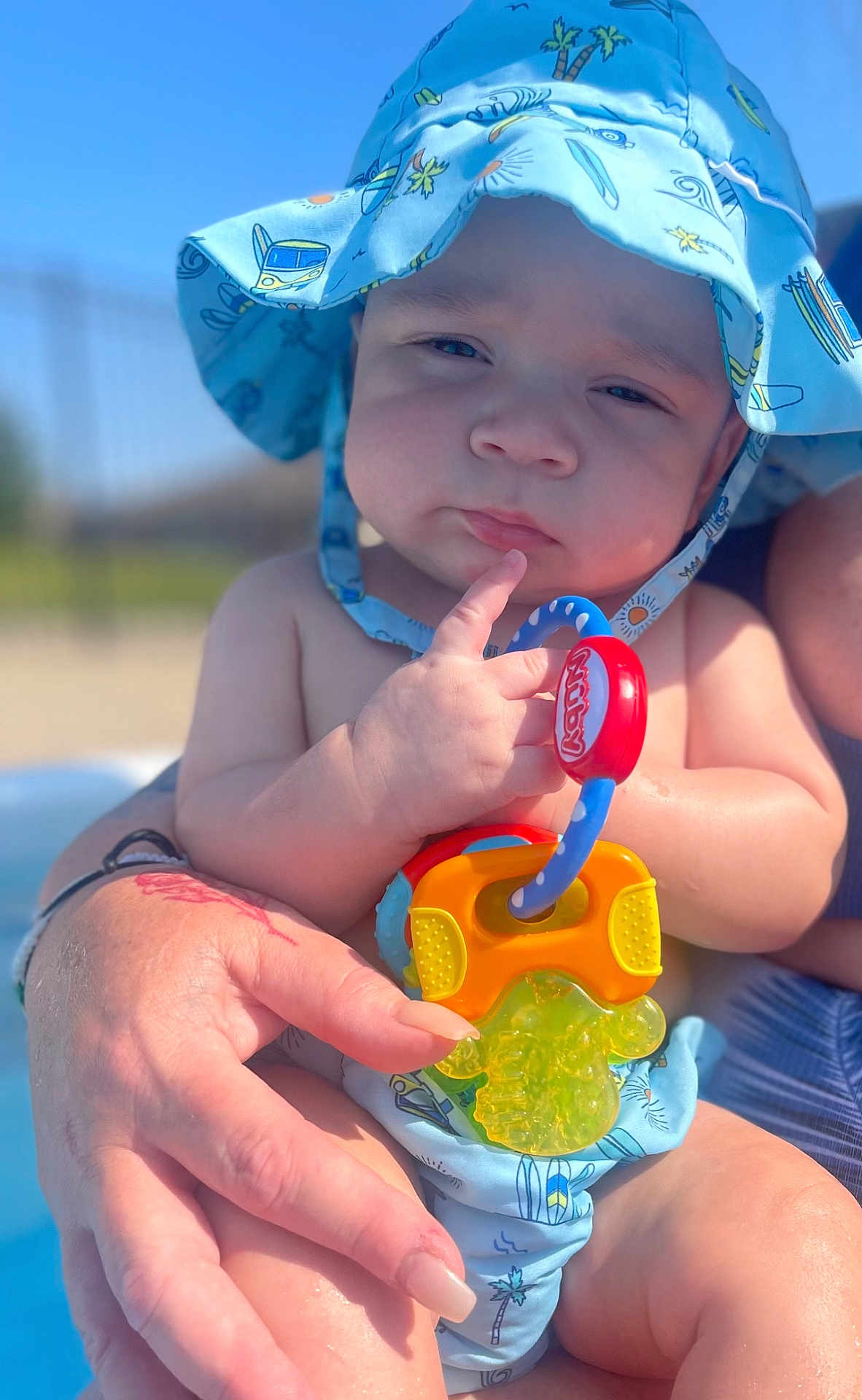 Legend joined the competition — help win amazing prizes! baby, baseballcap, bodypart, cap, clothing, face, finger, hand, hat, head, lifejacket, person, photography, pool, portrait, summer, sunhat, swimwear, vest, water