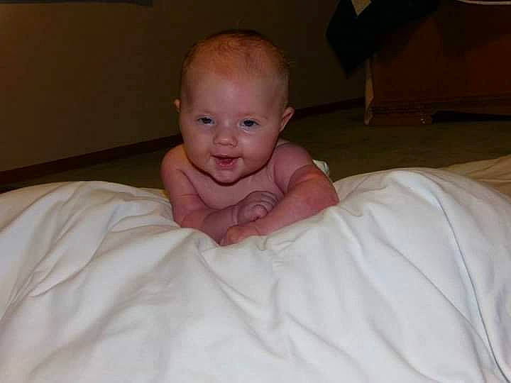 Raeleigh joined the competition — help win amazing prizes! arm, baby, bed, cheek, chest, comfort, eye, eyebrow, hair, hand, human_body, iris, leg, lip, neck, nose, person, smile, thumb, trunk