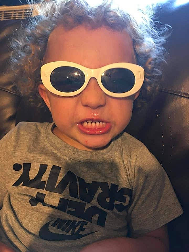 Dawson is registered to the contest to win money with this photo: cheek, chin, clothing, eye_glass_accessory, eyebrow, eyelash, eyewear, face, forehead, glasses, goggles, head, light, lip, mouth, nose, person, skin, smile, sunglasses