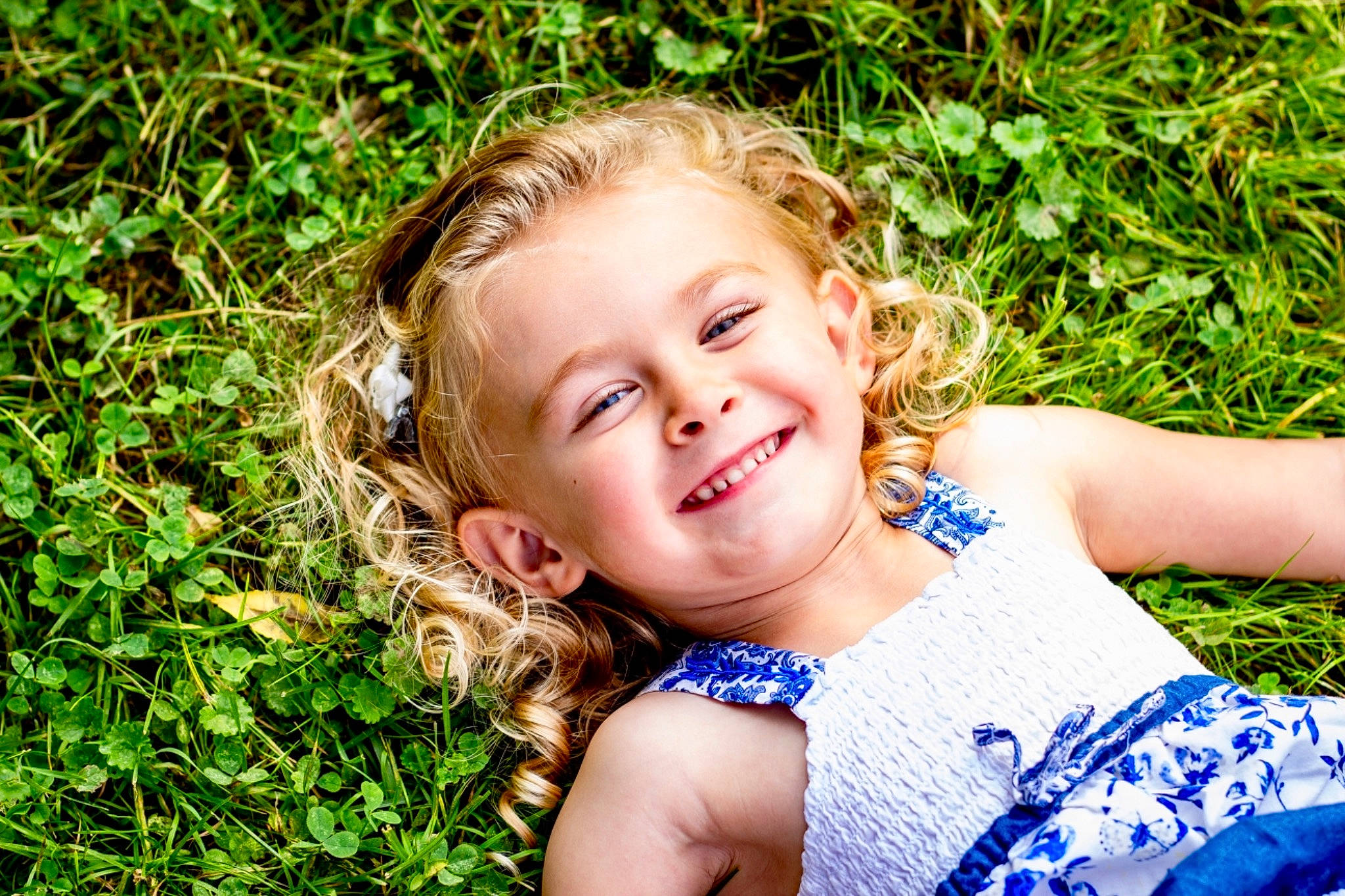 Leena joined the competition — help win amazing prizes! beauty, blond, child, child_model, emotion, eye, facial_expression, fun, girl, grass, grass_family, happiness, human_hair_color, joy, laughter, person, photograph, photography, portrait_photography, smile