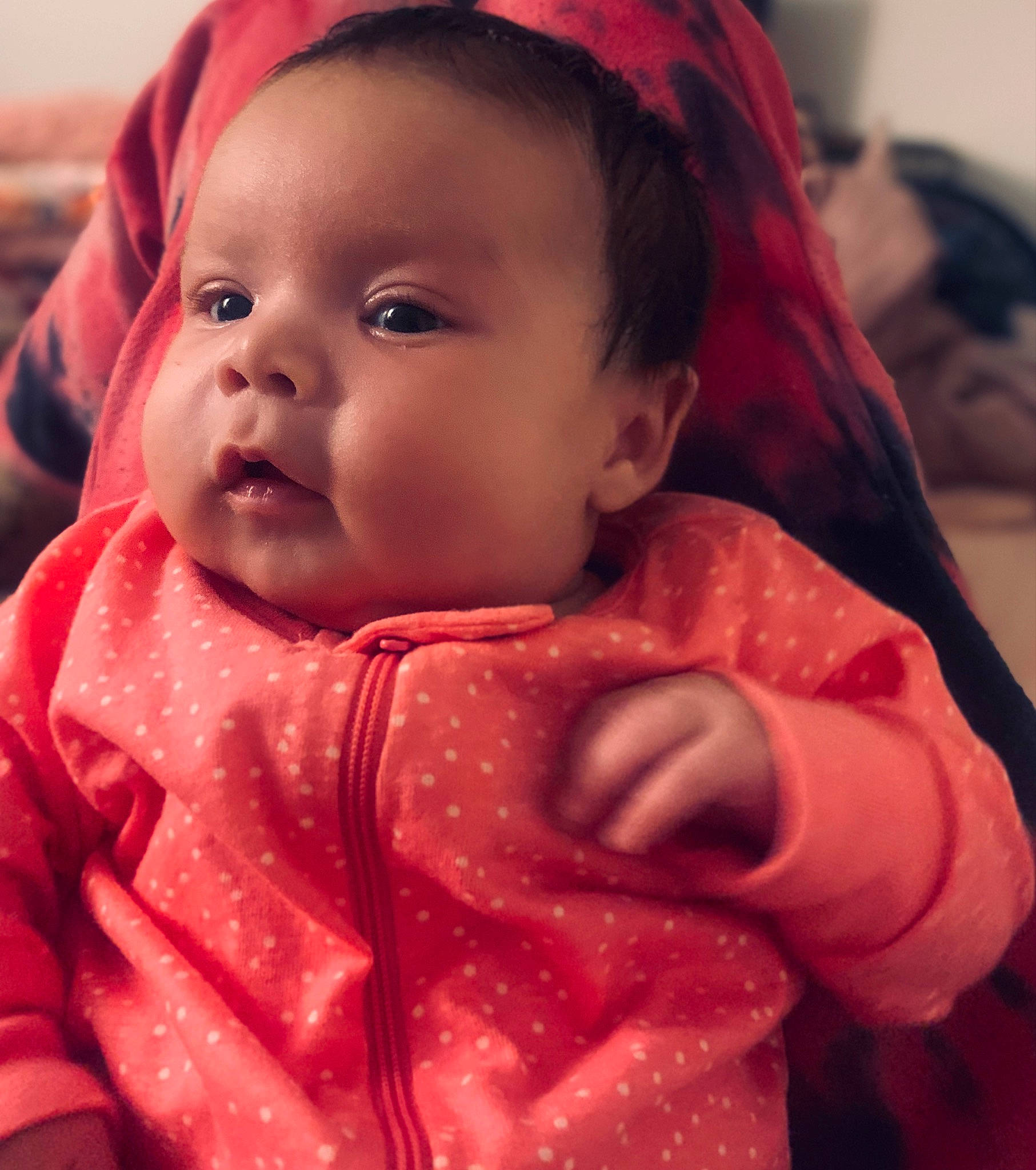 Sierra is registered to the contest to win money with this photo: baby, baby_toddler_clothing, cap, cheek, child, close_up, comfort, eyelash, face, fun, happy, human_body, iris, lip, mouth, nose, person, pink, skin, sleeve