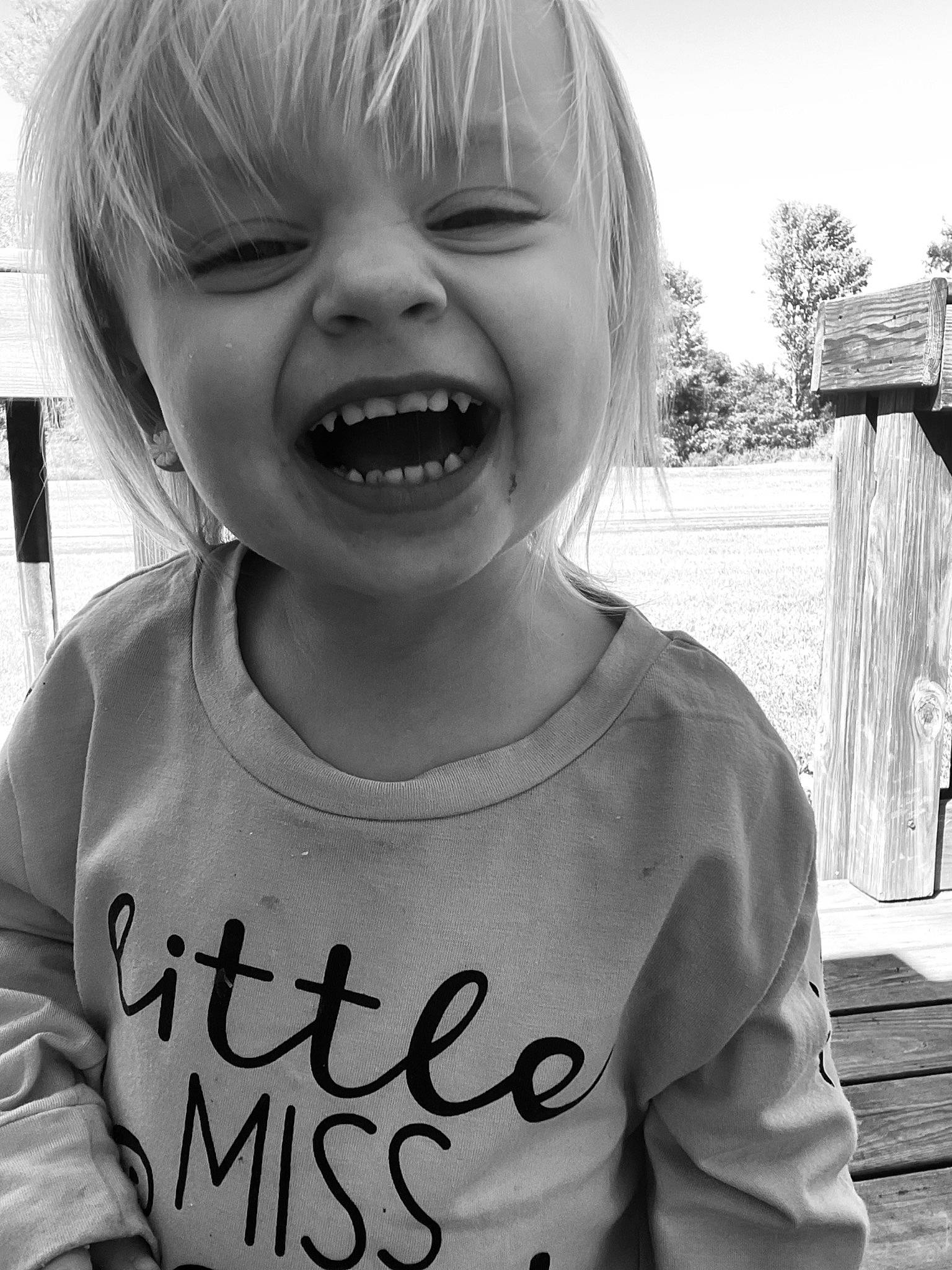 Liberty is registered to the contest to win money with this photo: black, cheek, eyebrow, eyelash, facial_expression, gesture, hairstyle, happy, human, lip, mammal, mouth, neck, nose, organ, person, sleeve, smile, standing, tooth