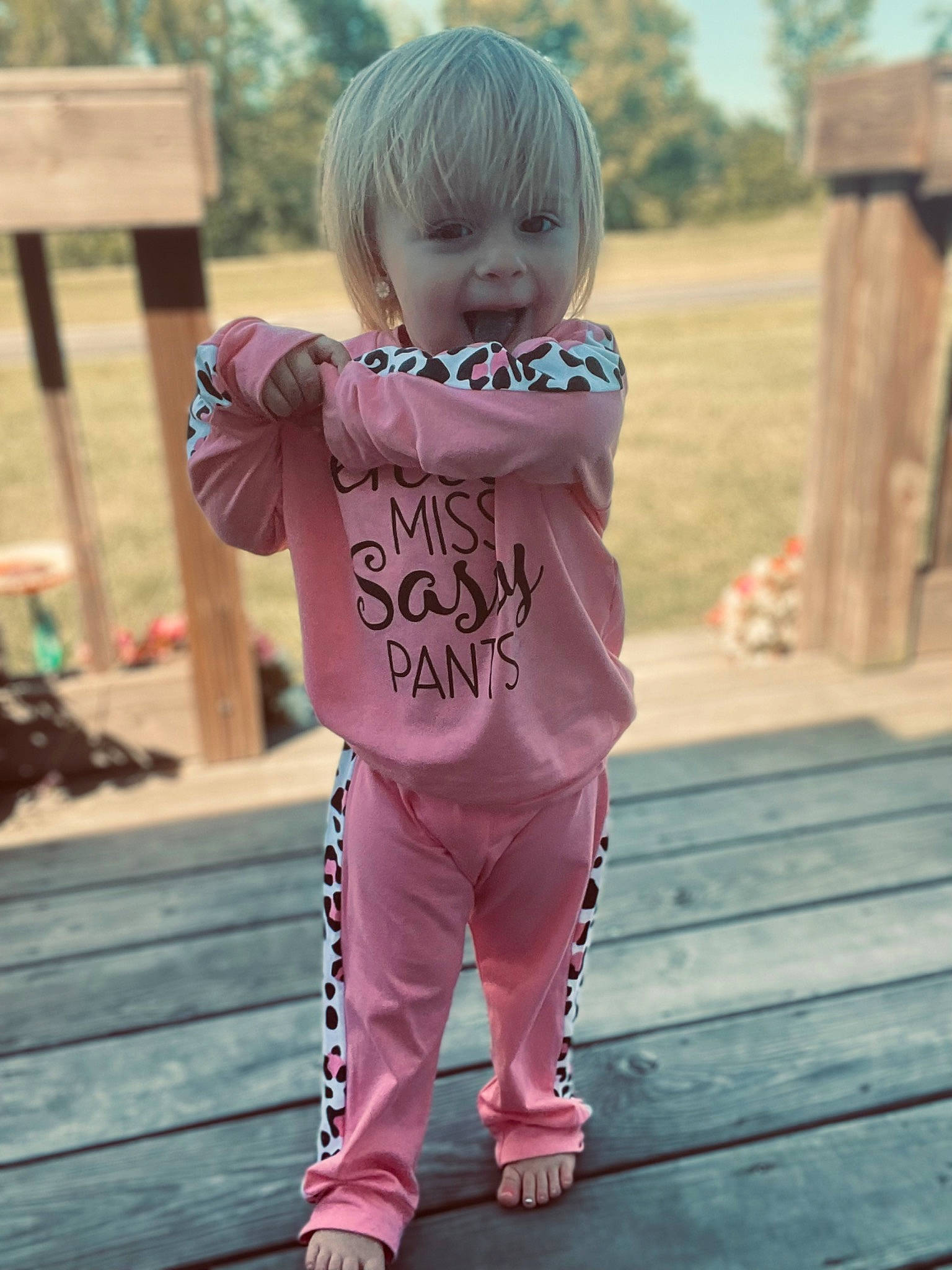 Liberty joined the competition — help win amazing prizes! baby, baby_toddler_clothing, child, fun, grass, hair, happy, leisure, magenta, pattern, person, pink, plant, sitting, sleeve, standing, t_shirt, toddler, tree, waist