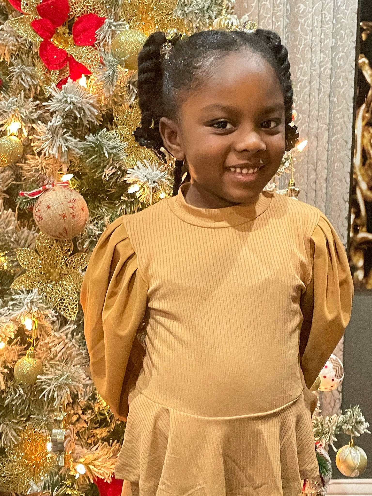 Alyssa joined the competition — help win amazing prizes! adaptation, baby_toddler_clothing, child, christmas_tree, event, facial_expression, flowerpot, hair, hairstyle, happy, head, holiday_ornament, houseplant, joy, ornament, people_in_nature, person, plant, sleeve, smile