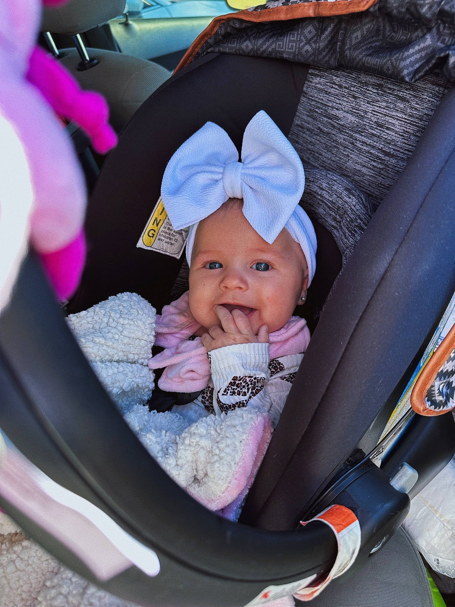 Kodie is registered to the contest to win money with this photo: auto_part, baby, baby_carriage, baby_in_car_seat, baby_products, baby_safety, baby_toddler_clothing, car_seat, child, comfort, electric_blue, family_car, fashion_accessory, headwear, luxury_vehicle, person, seat_belt, sitting, smile, steering_wheel