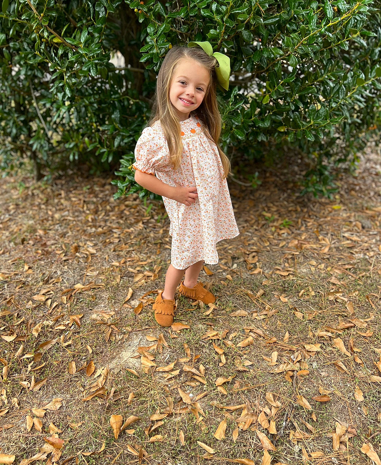Beau is registered to the contest to win money with this photo: adaptation, baby_toddler_clothing, botany, day_dress, deciduous, fawn, grass, groundcover, happy, joy, leaf, pattern, people_in_nature, person, plant, shoe, smile, soil, tints_and_shades, toddler