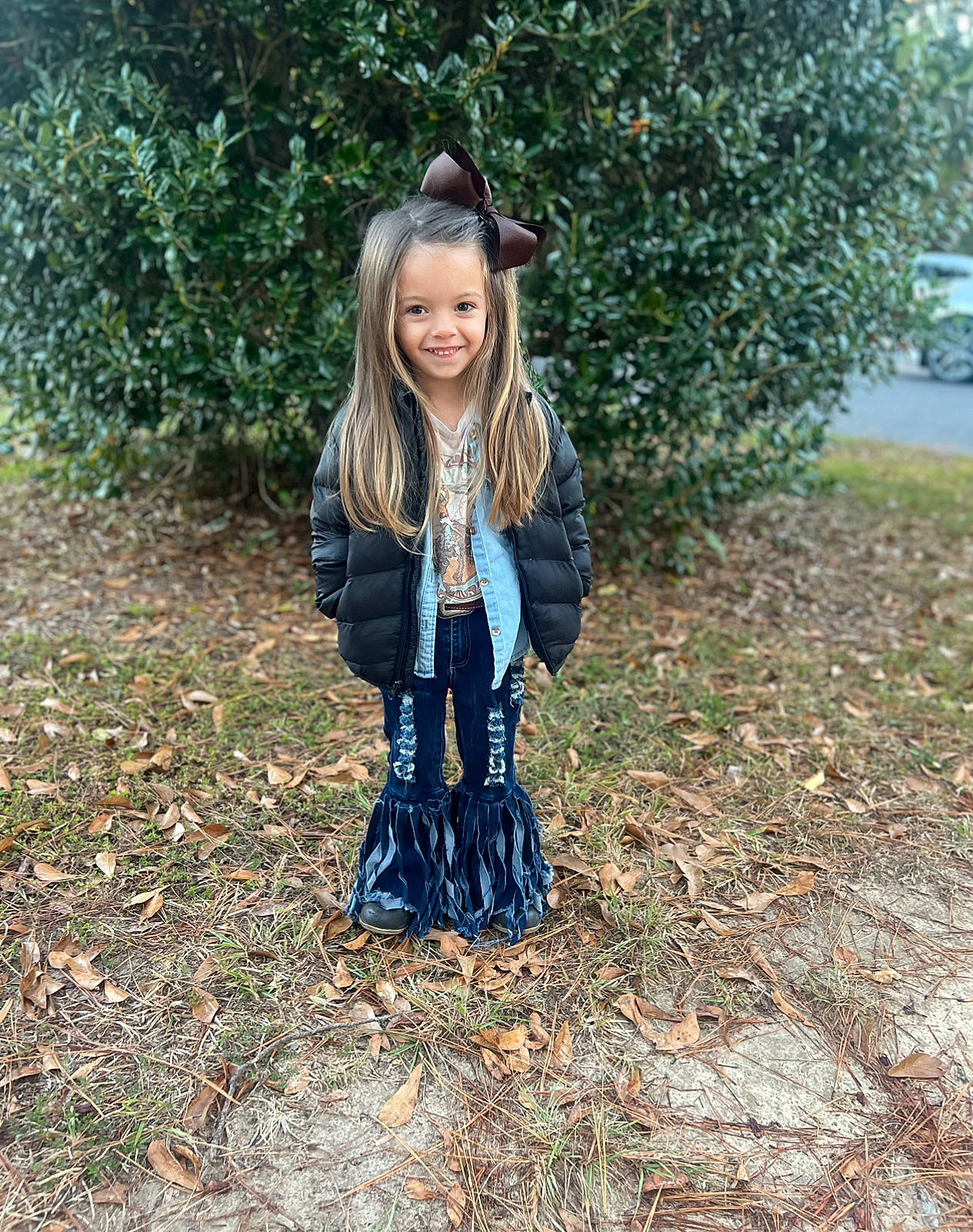 Beau is registered to the contest to win money with this photo: child, denim, electric_blue, fashion_accessory, fun, grass, happy, jewellery, joy, pattern, people_in_nature, person, plant, recreation, scarf, sitting, sleeve, smile, soil, toddler