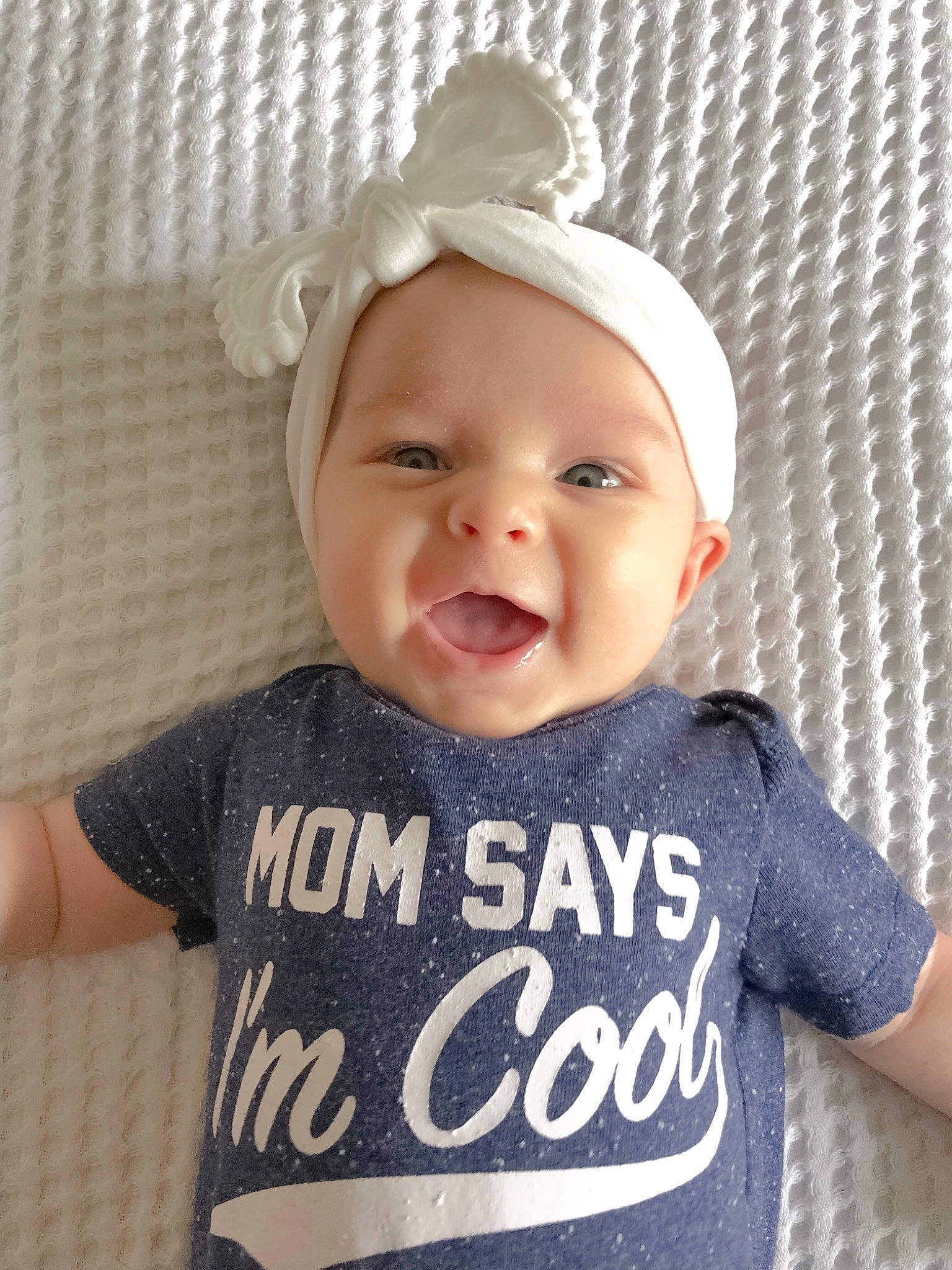 Brinley joined the competition — help win amazing prizes! baby_products, beanie, bonnet, cap, cheek, child, cool, day, ear, hair_accessory, hat, headgear, infant, knit_cap, pattern, person, product, smile, t_shirt, toddler