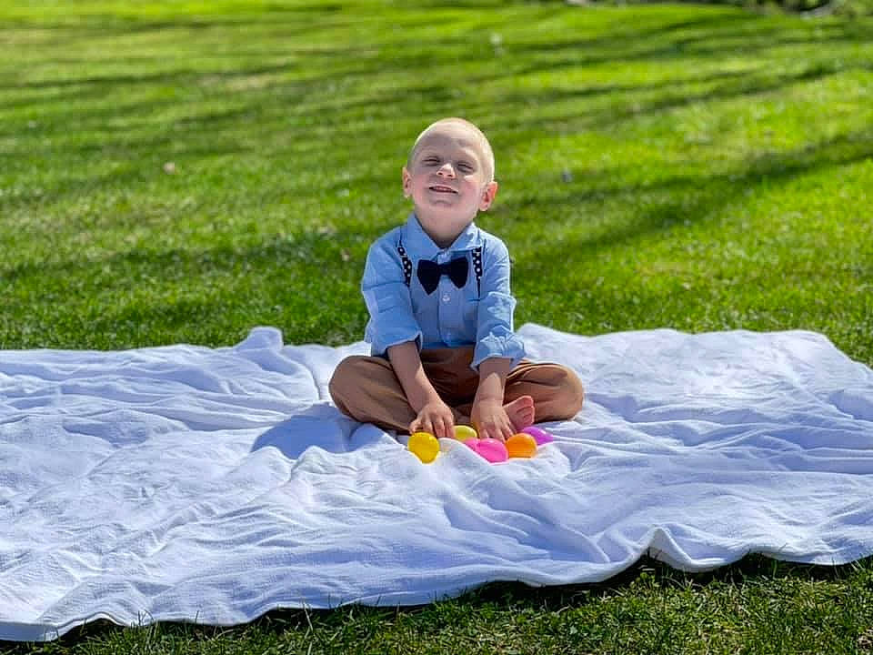 Bentley joined the competition — help win amazing prizes! baby, dress, fun, grass, grass_family, grassland, happy, leaf, leisure, mammal, meadow, morning, people, people_in_nature, person, plant, recreation, shorts, smile, summer