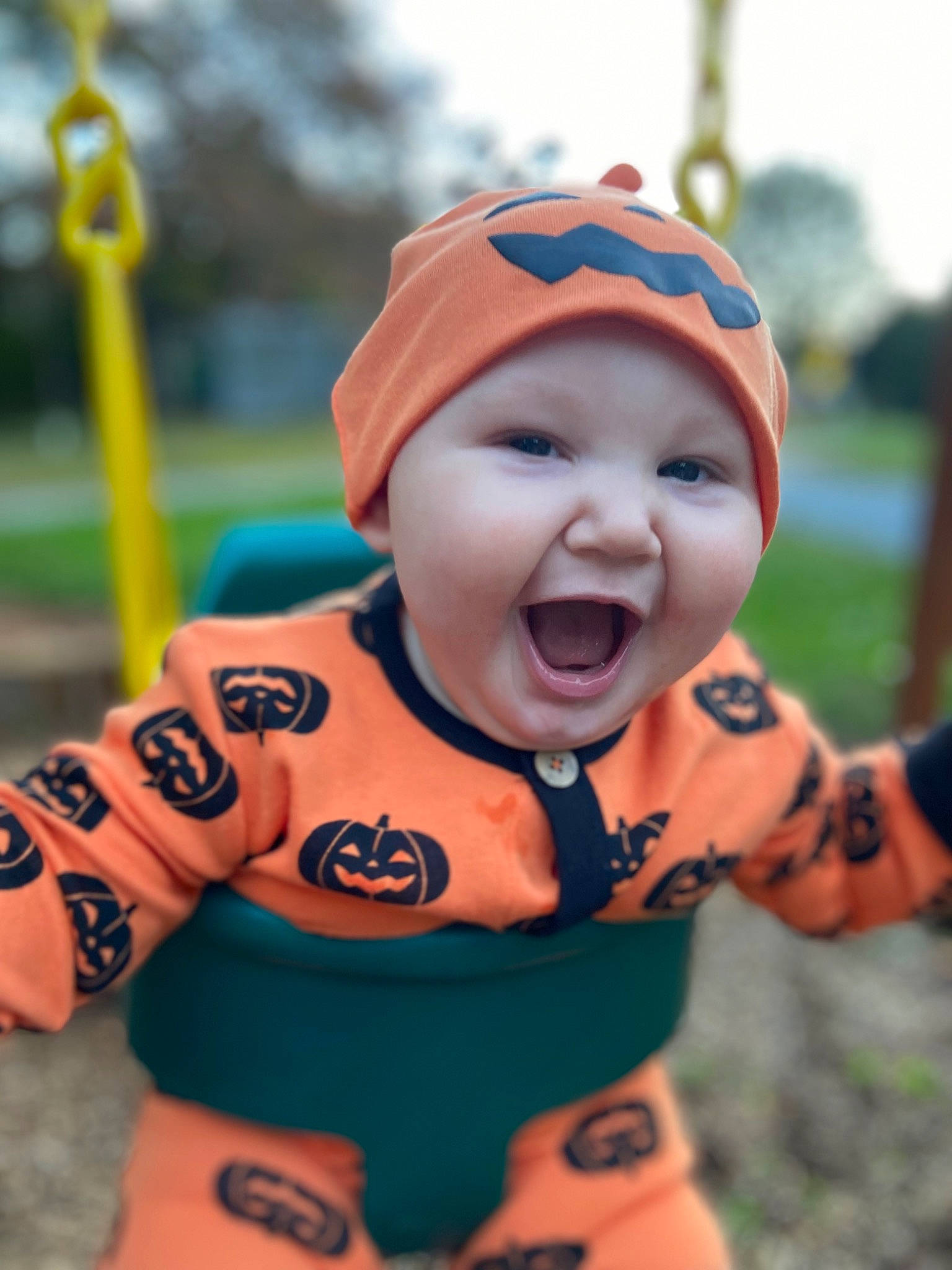 Juniper joined the competition — help win amazing prizes! baby, baby_products, baby_toddler_clothing, baseball_cap, cap, child, face, fun, gesture, grass, happy, headwear, leisure, person, personal_protective_equipment, play, recreation, sleeve, smile, thumb