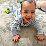 Ander is registered to the contest to win money with this photo: baby, crawling, smiling, blue_clothing, carpet, toy, indoor, child, happy, face, hands, floor, head, infant, playtime, home, cute, young_child, person, expression