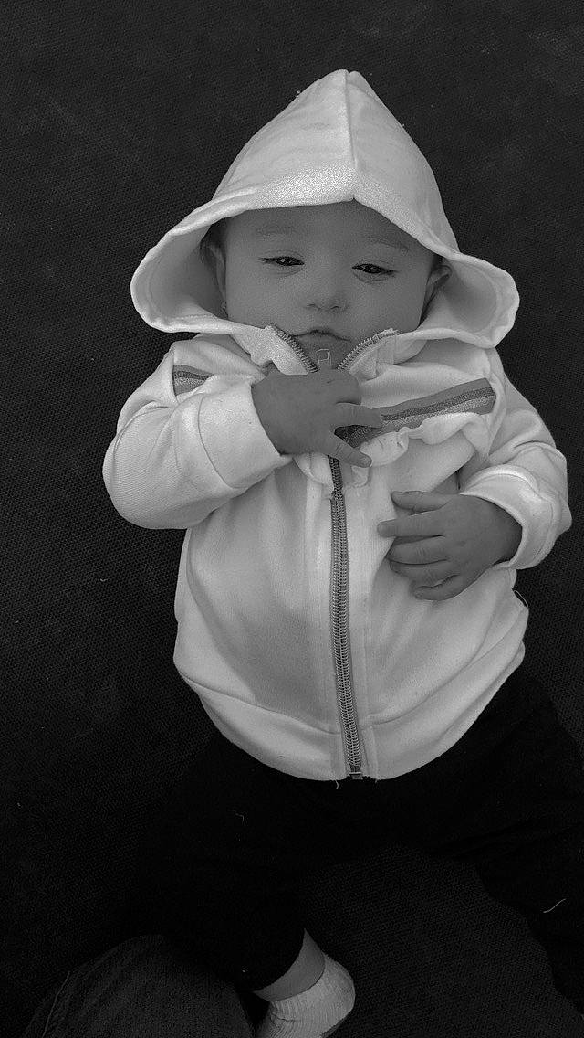 Paityn joined the competition — help win amazing prizes! baby, baby_products, cap, cheek, child, elbow, facial_expression, fashion_accessory, flash_photography, fun, gesture, happy, headgear, headwear, monochrome, monochrome_photography, person, sitting, sleeve, smile