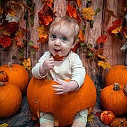 Isaac joined the competition — help win amazing prizes! baby, pumpkin, fall, autumn, leaf, orange, cute, child, seasonal, holiday, decor, smile, sitting, background, wood, floor, nature, festive, cozy, playful