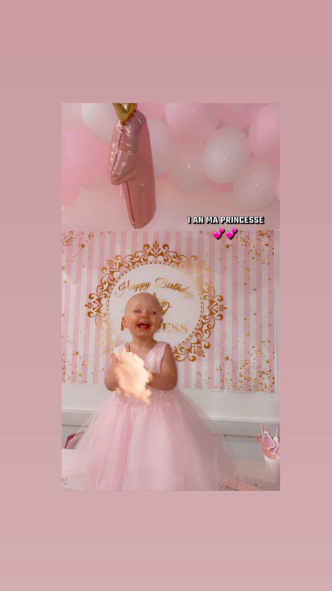 Ilyana participe au concours pour gagner de l'argent avec cette photo : art, baby, bridal_accessory, bridal_party_dress, day_dress, dress, event, fashion_design, font, formal_wear, gown, happy, headpiece, magenta, party_supply, pattern, peach, person, petal, pink