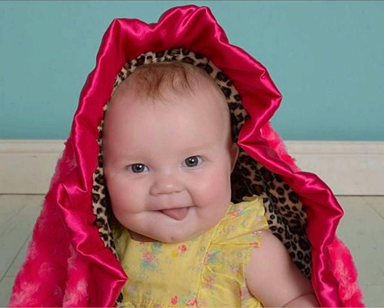 Jadyn is registered to the contest to win money with this photo: baby, beauty, cheek, child, eye, face, facial_expression, forehead, hair, hair_accessory, head, headgear, headpiece, joy, lip, nose, person, pink, product, skin