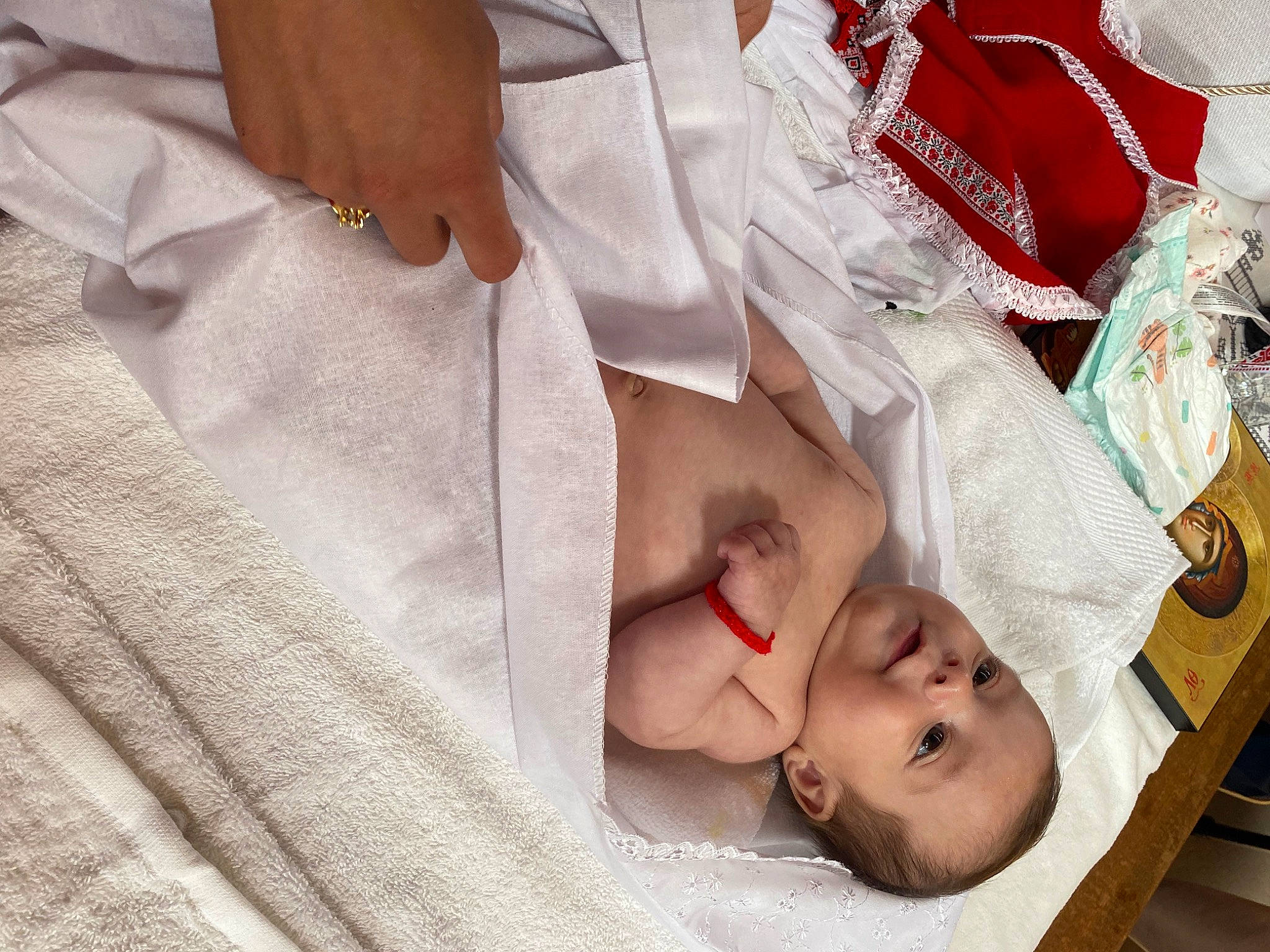 Katalleya Miriam a rejoint le concours — aidez-le/la à gagner de superbes lots ! baby, baby_products, baby_toddler_clothing, child, comfort, dress_shirt, event, linens, peach, person, room, service, sleep, sleeve, toddler