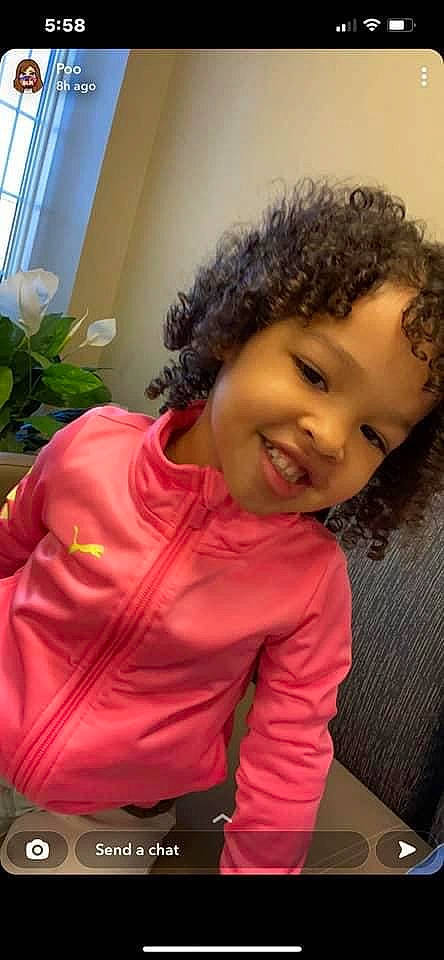 Nadia is registered to the contest to win money with this photo: black_hair, cheek, chin, eye, eyebrow, face, forehead, hair, hairstyle, happy, houseplant, joy, lip, mouth, nose, outerwear, person, plant, shoulder, skin