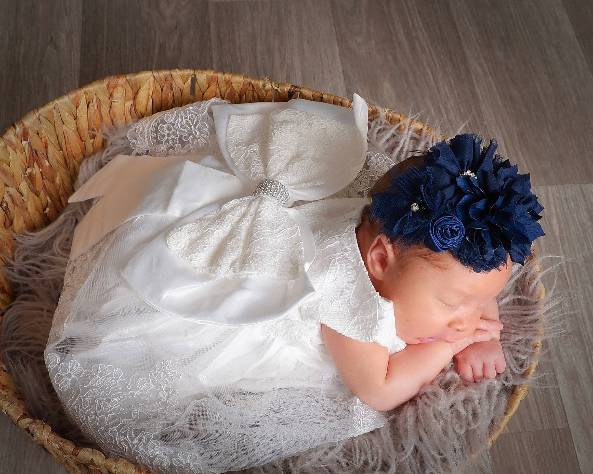 Brayleigh is registered to the contest to win money with this photo: baby, baby_toddler_clothing, bridal_accessory, comfort, costume_hat, crown, cut_flowers, dress, embellishment, fashion_accessory, hair_accessory, hat, headband, headgear, headpiece, human_body, jewellery, person, petal, toddler