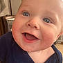 Kaliber is registered to the contest to win money with this photo: baby, close_up, smile, blue_eyes, face, infant, happy, child, indoor, portrait, cute, skin, clothing, young, person, head, cheeks, mouth, tongue, expression