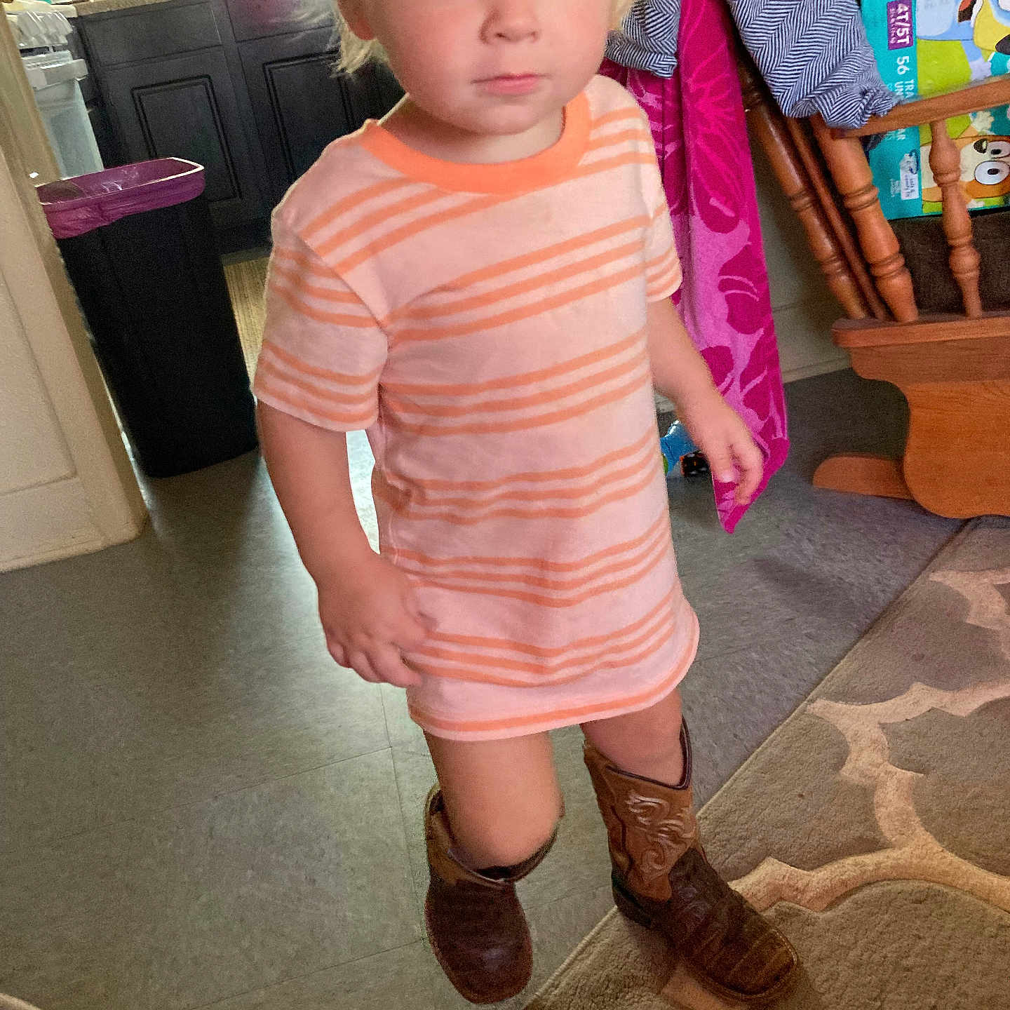 Kaliber joined the competition — help win amazing prizes! blond_hair, boy, cabinet, carpet, casual, child, clothing, cowboy_boots, curious, floor, footwear, furniture, home, indoor, kitchen, light, person, rug, standing, striped_shirt