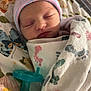 Blakelynn Elizabeth is registered to the contest to win money with this photo: newborn, baby, sleeping, blanket, butterfly, hat, pacifier, hospital, swaddle, infant, face, headwear, soft_light, indoor, closeup, cute, peaceful, wrapped, nursery, person