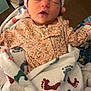Blakelynn Elizabeth is registered to the contest to win money with this photo: newborn, baby, sleeping, blanket, footprint_pattern, beanie, striped_hat, floral_onesie, infant, cozy, indoor, child, wrapped, cute, peaceful, hand, soft, portrait, resting, person